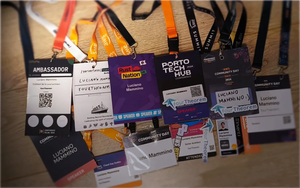 Some of the conference badges that I collected in 2024