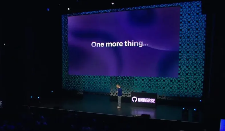 GitHub Universe 2023, Day 1, Thomas Dohmke on stage with a slide in the background saying \